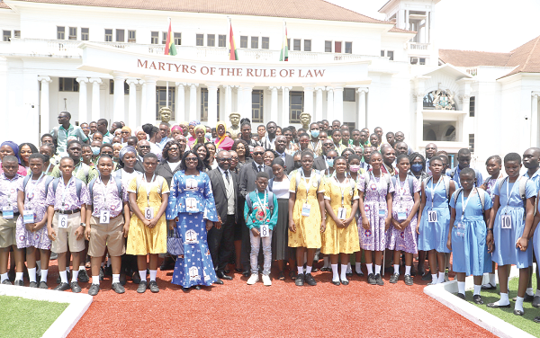 Justice Anin Yeboah (arrowed), the Chief Justice with some Justices of the Superior Court and the students after the programme in Accra. Picture: GABRIEL AHIABOR